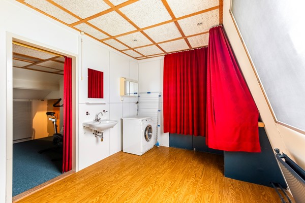 Foto - Te koop: tussenwoning gelegen aan groenvoorziening